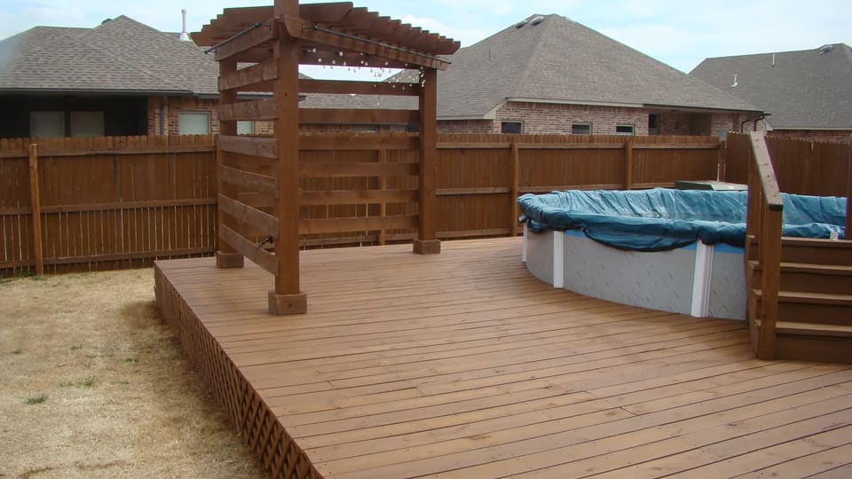 Backyard deck finished with sable brown stain
