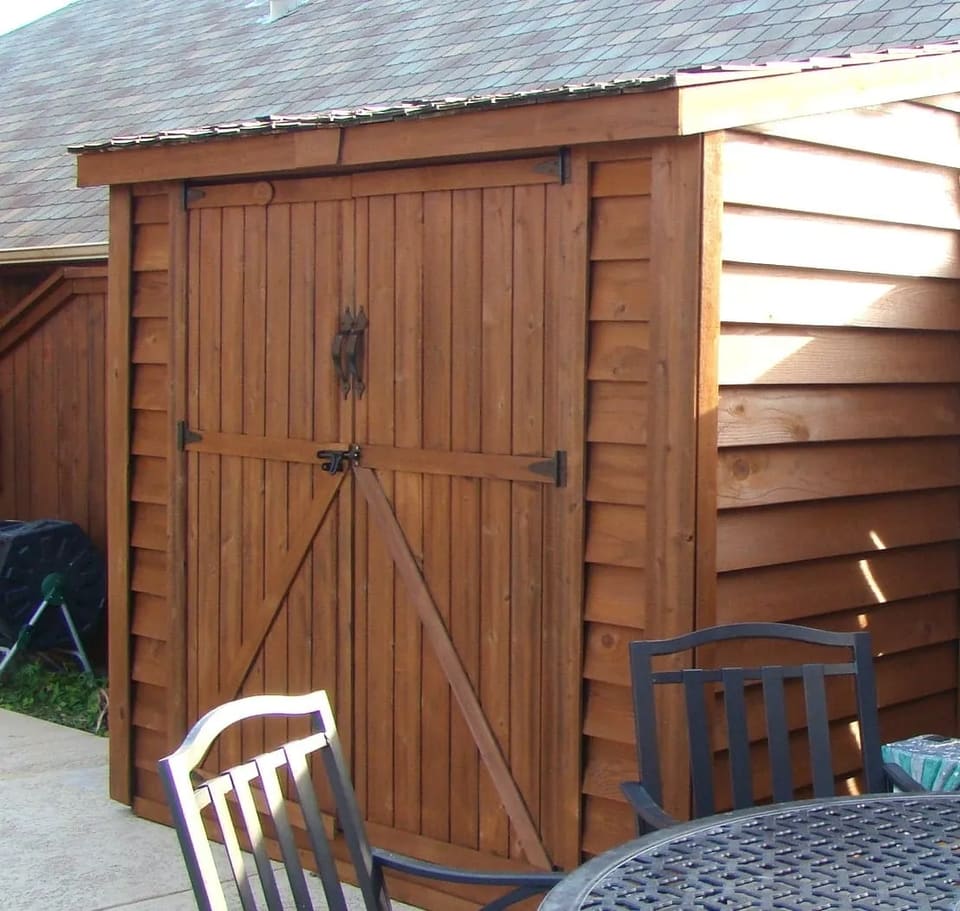 Small shed stained with sable brown from wood defender
