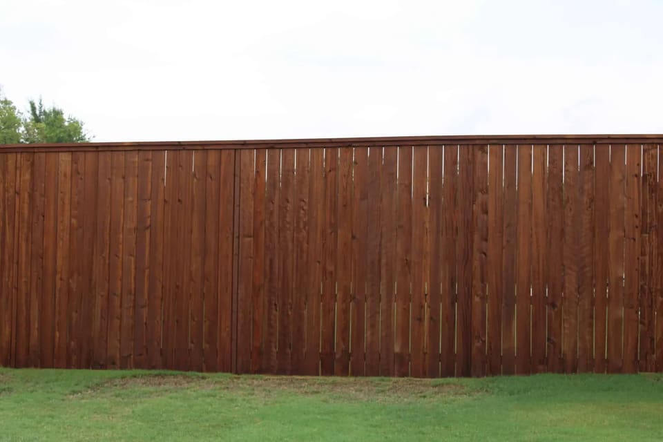 fence in Bethany, OK with a new fence stain on it
