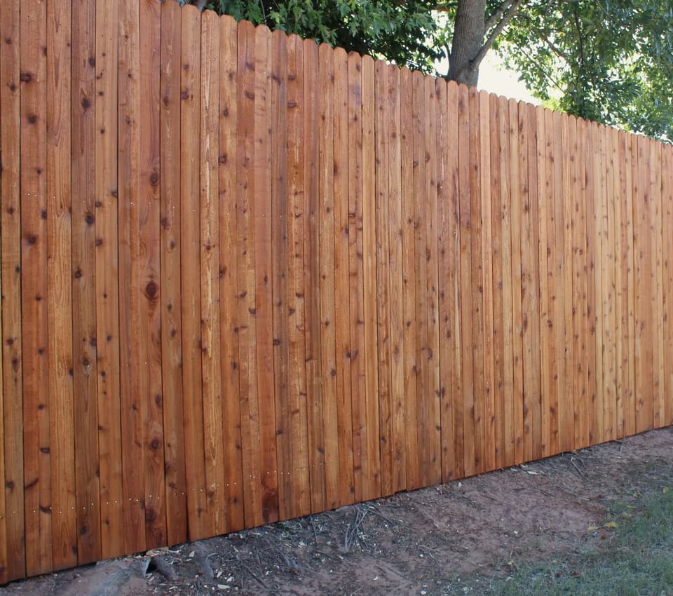 Freshly stained cedar privacy fence in Bethany, OK