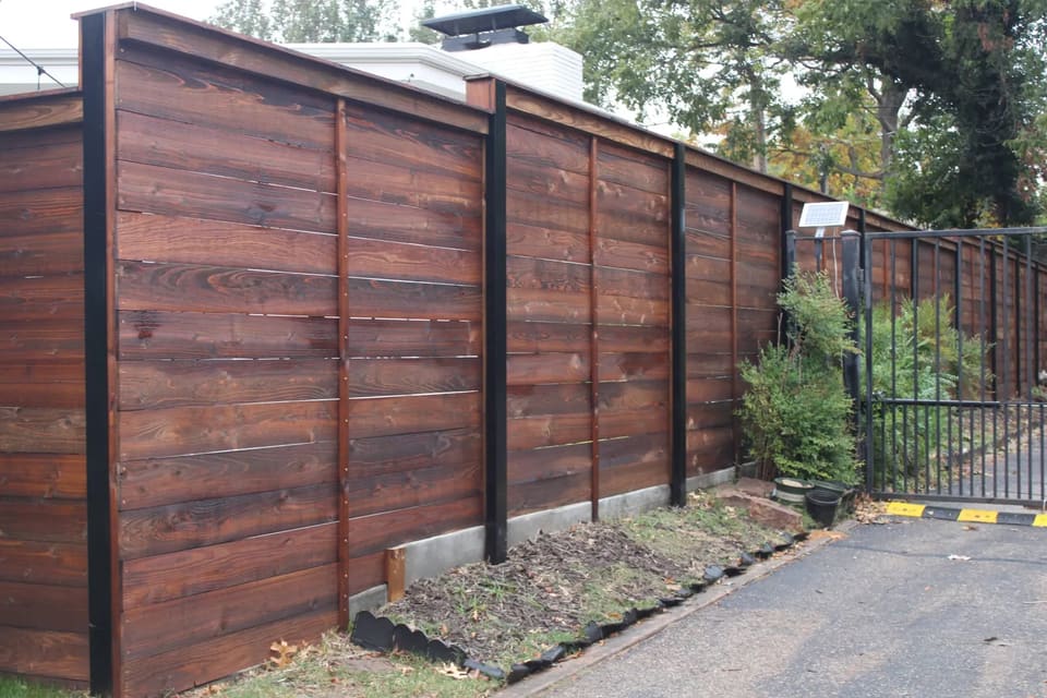 Privacy fence stained Oxford Brown by Hometown Painting