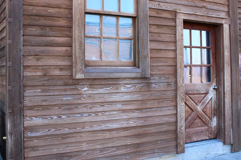 old faded stain on the barn siding